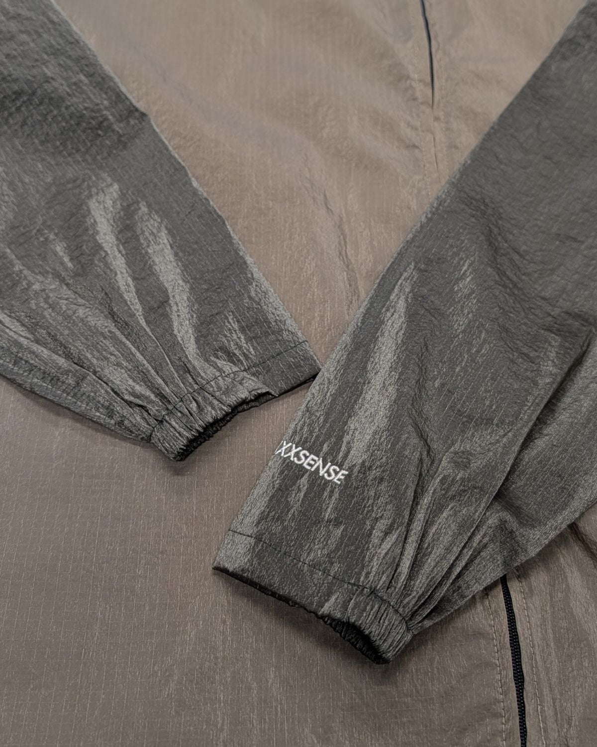XXXXXSENSE / SHINY RIP TRACK WIND JACKET｜エックスセンスの通販